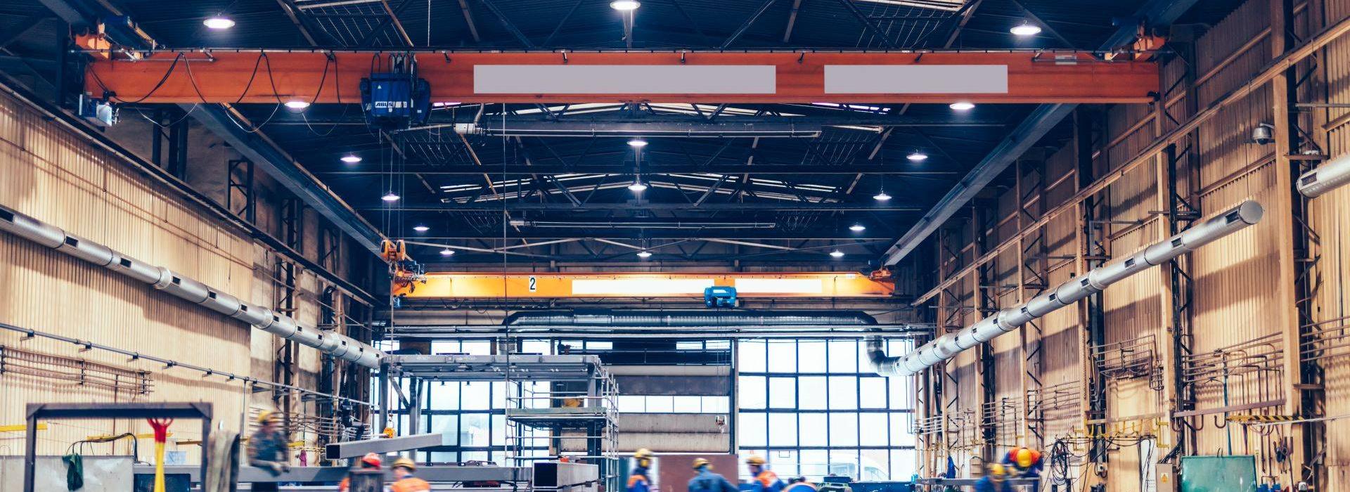 large-factory-hall-blue-collar-workers-at-work-2023-11-27-05-14-45-utc (1)